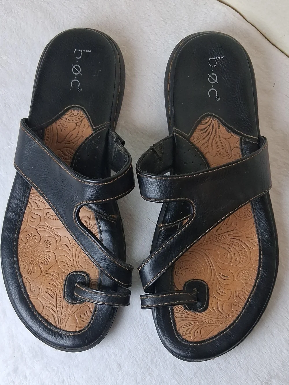 b.o.c. Black Slide Sandals with Tan Embossed Footbed